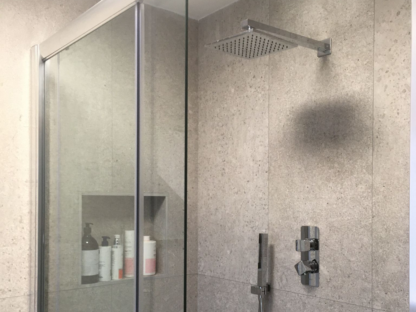 Shower unit with shelving installed by Elite Building Services Swords